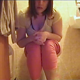A girl records herself shitting while sitting on a toilet in about 6 scenes. Audible pooping sounds. About 13.5 minutes.